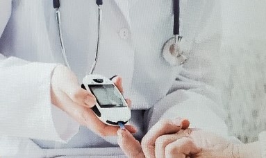 A doctor conducting a blood glucose test